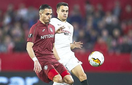 Sergio Reguilon, în duel cu Cristi Manea (vișiniu), foto: Guliver/gettyimages