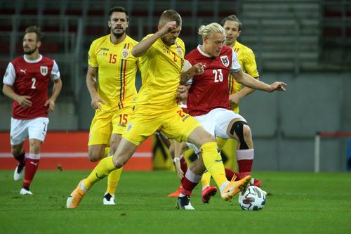 Alexandru Crețu (#2, în galben), în Austria - România 2-3 // foto: Imago