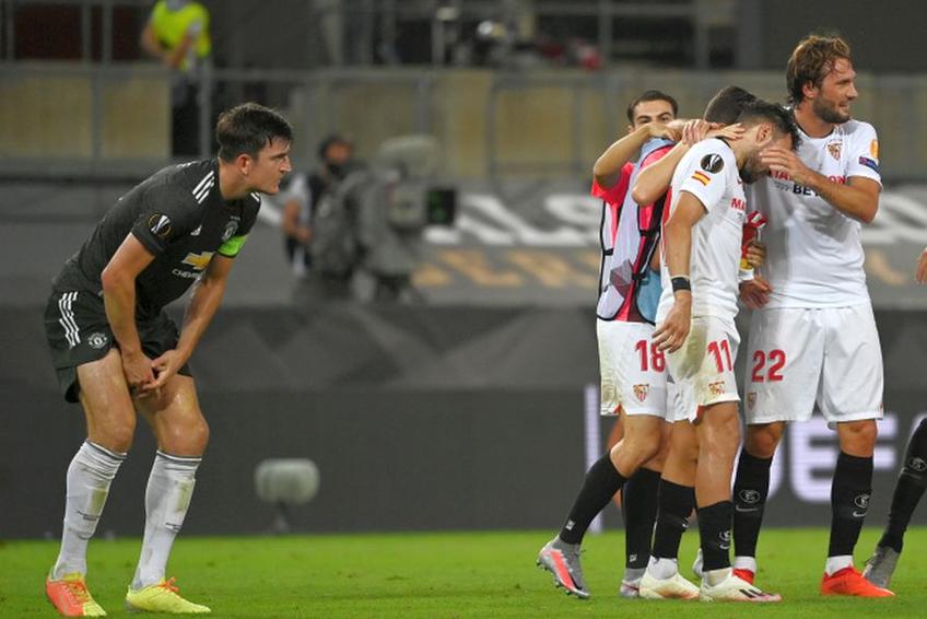 Harry Maguire (stânga), în Sevilla - Manchester United // foto: Guliver/gettyimages
