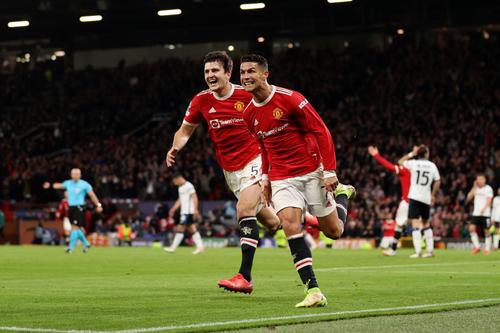 Harry Maguire și Cristiano Ronaldo/ foto: Guliver/GettyImages