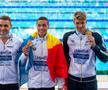 David Popovici, cu medalia de aur de la 100 de metri. În stânga, maghiarul Milak (argint). În dreapta, italianul Miressi (bronz) / foto Raed Krishan (GSP)