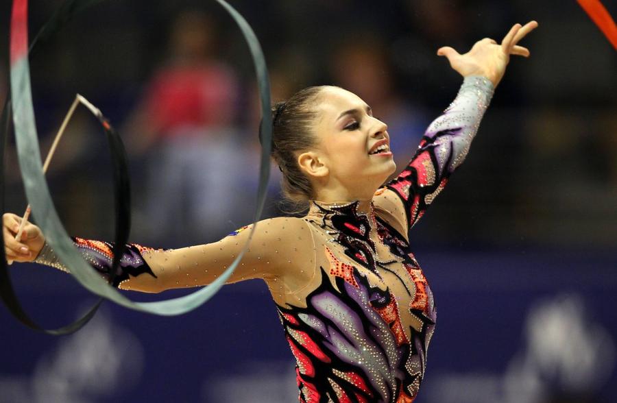 Alexandra Piscupescu, în 2011 / Sursă foto: Imago Images „«Ești tâmpită!», apoi dădea cu bățul în cap!” » GSP publică 5 mărturii ȘOCANTE din lotul olimpic de gimnastică ritmică! Traume, abuzuri, acuze GRAVE la adresa președintei Irina Deleanu și a antrenoarei Maria Gîrbă: „M-a băgat în perete!”