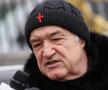 Gigi Becali, apariție inedită » Și-a asortat hainele cu tematică religioasă cu încălțăminte de fițe