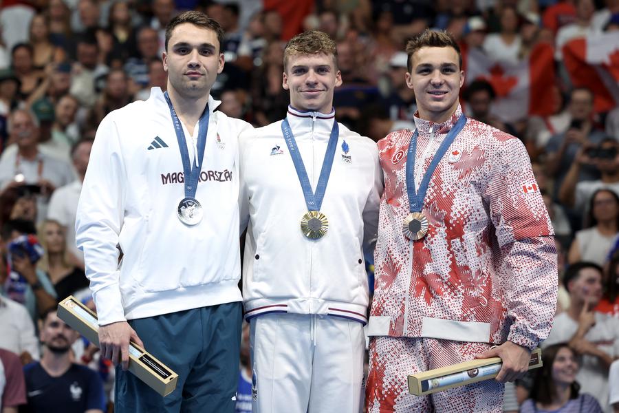 Podiumul olimpic din proba de 200 metri fluture cu Milak, Leon Marchand și Ilya Kharun FOTO Gulliver/GettyImages Un campion olimpic din Ungaria a acordat primul interviu după un an și jumătate de tăcere: „Am făcut o greșeală, îmi pare rău...”