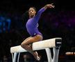 Simone Biles într-un exercițiu la bârnă Foto: Imago