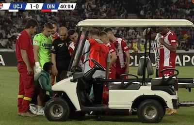 AUCH! Ciocnire horror în U Cluj - Dinamo: fotbalistul lui Uhrin, schimbat după ce a fost făcut K.O. de Ely Fernandes!