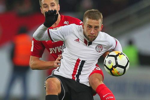 Janusz Gol (alb), când evolua pentru Amkar Perm // foto: Guliver/gettyimages