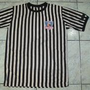 Un tricou al lui Colo-Colo din anii 60 prezenta dunga tot pe mânecă