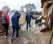 Imaginile zilei vin de la Cluj! Jucătorii lui CFR, gest superb: nu au ținut cont de noroiul care „inunda” gospodăriile