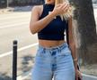 Iuliana Pepene, cea mai sexy prezentatoare de știri din România, se „luptă” cu greutățile în sala de forță