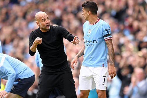 Joao Cancelo, alături de Pep Guardiola // foto: Guliver/gettyimages