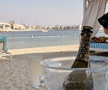 Constantin Budescu, cu șampania pe plajă în vacanță în Dubai