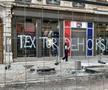 Fanii au scris cu vopsea mesaje contra patronului John Textor și pe vitrinele magazinelor clubului / Foto: X