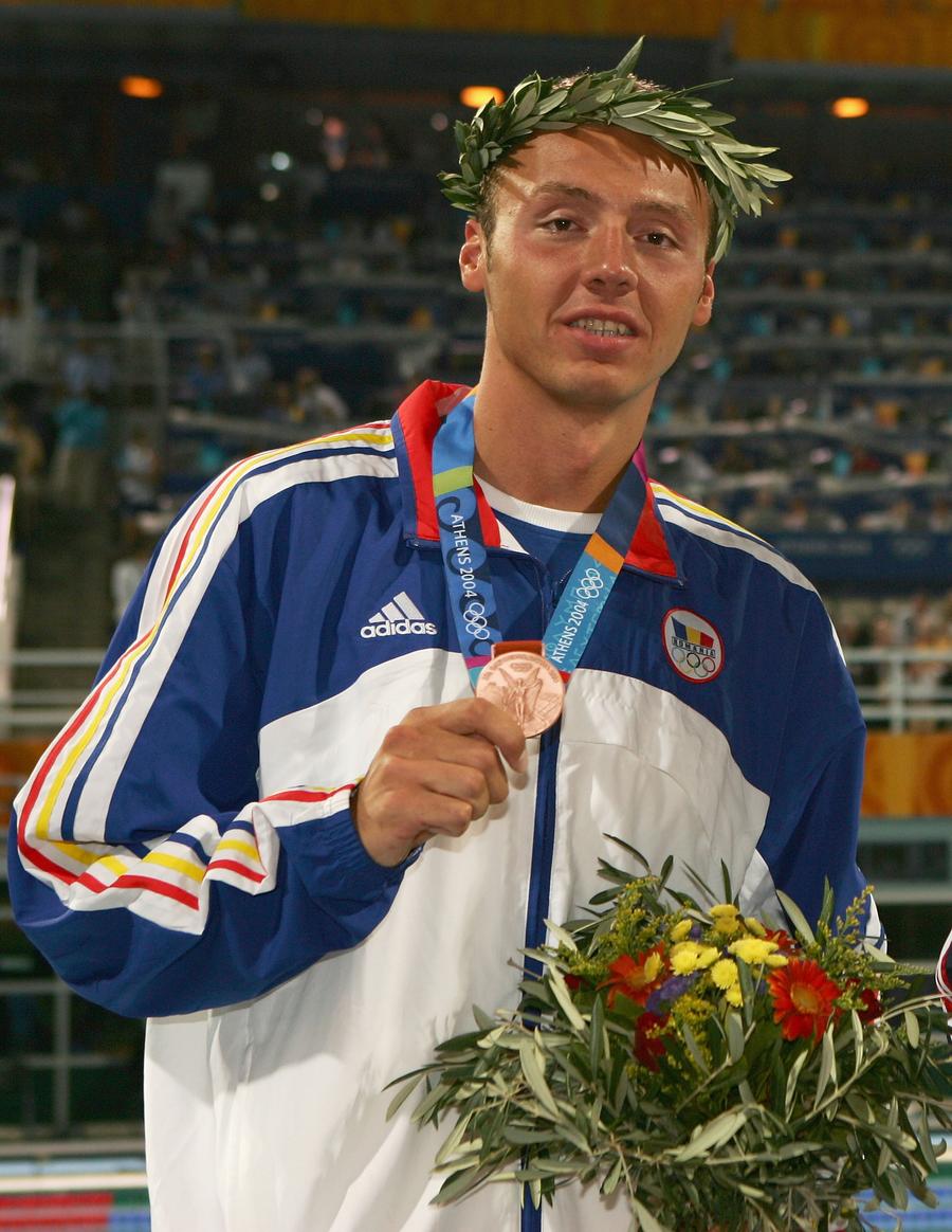 Răzvan Florea la Atena în 2004 FOTO Guliver/GettyImages Răzvan Florea, singurul medaliat olimpic român la înot, a dat pronosticurile pentru probele lui David Popovici de la Paris: „Nu are cine să îl bată la 200. La 100 e ceva mai complicat”