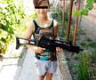 M.D., minorul acuzat de omor în cazul crimei din Cenei, fotografiat alături de o armă de jucărie