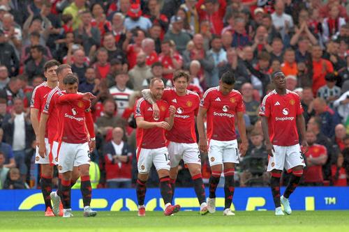 Christian Eriksen (centru) s-a temut de retrogradarea cu Manchester United. Foto: Getty Images