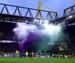 Moment INCREDIBIL pe stadionul Borussiei Dortmund » O echipă de renume din România, sărbătorită de nemți: torțe, fum și un mesaj imens