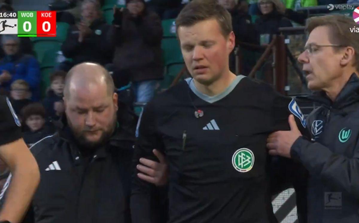 Moment bizar la Wolfsburg - Koln » Ce a urmat, după ce arbitrul asistent a fost făcut KO: „Situația deja devine ciudată”