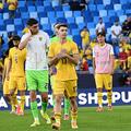 Vlad Rafailă, în stânga, cu tricoul alb și șortul verde / foto: Imago Image