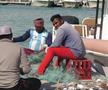 Am asistat la ritualul aducerii, scoaterii și spălării crabilor în Piața de Pește din Doha » Câți bani au încasat pescarii indieni pentru captura de jumătate de tonă, într-o zi de muncă