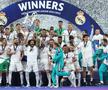 Imagini FABULOASE cu bucuria jucătorilor lui Real Madrid: Kroos și Modric s-au tăvălit pe gazon, Marcelo a vrut să fugă cu trofeul