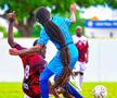 Aedan Scipio (Anguilla) a fost tras de păr de Keon Greene și de Shalon Knight din Antigua și Barbuda, în timpul unui meci din Liga Națiunilor CONCACAF