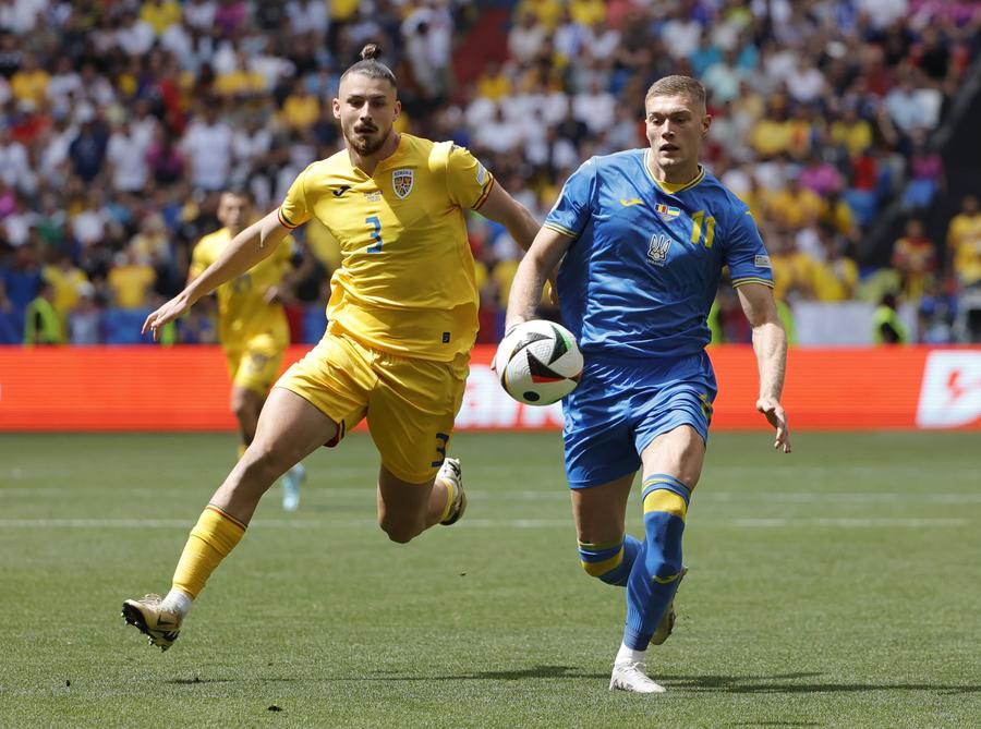 Radu Drăgușin și Artem Dovbyk, în România - Ucraina, de la Euro 2024 // foto: Imago Images Radu Drăgușin, integralist la Tottenham în remiza nebună cu Roma. Final dramatic în meciul de Europa League