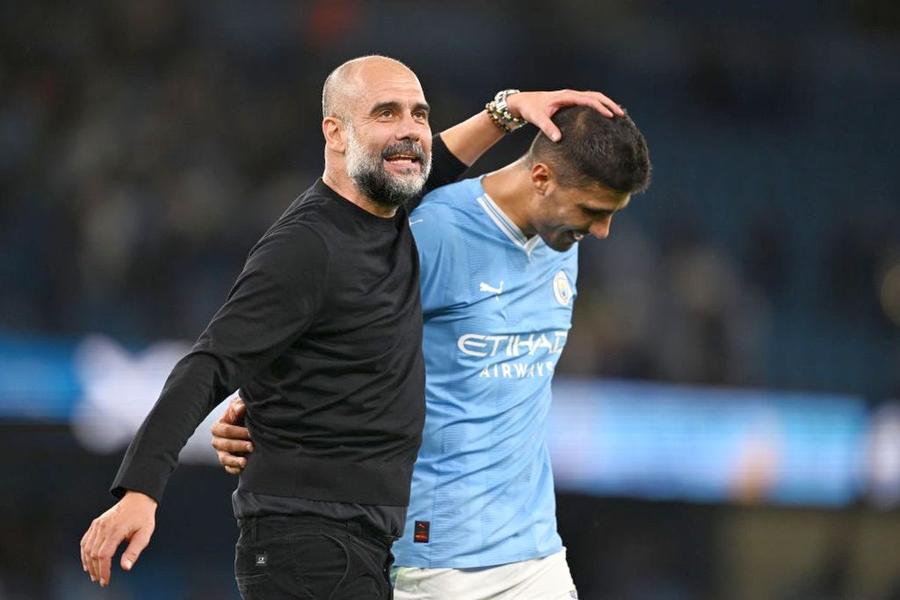 Pep Guardiola și Rodri / Foto: X Ce pretenții are Manchester City pentru a-l ceda pe Rodri! » Răspunsul dat de Real Madrid a venit pe loc