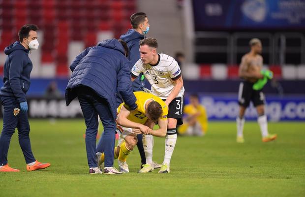 Tristețe fără margini » Imagini emoționante surprinse de fotoreporterul GSP: „tricolorii”, îmbărbătați de fotbaliștii nemți