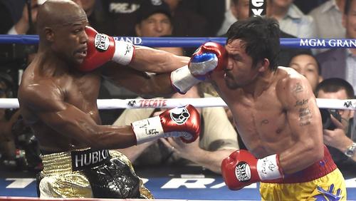 Floyd Mayweather Jr. și Manny Pacquiao, aici în timpul luptei din 2015 Foto: Imago Images