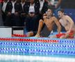 David Popovici și Pan Zhanle, care tocmai spulberase recordul mondial, privesc rezultatele cursei de 100 m liber / FOTO: Raed Krishan (GSP.ro)