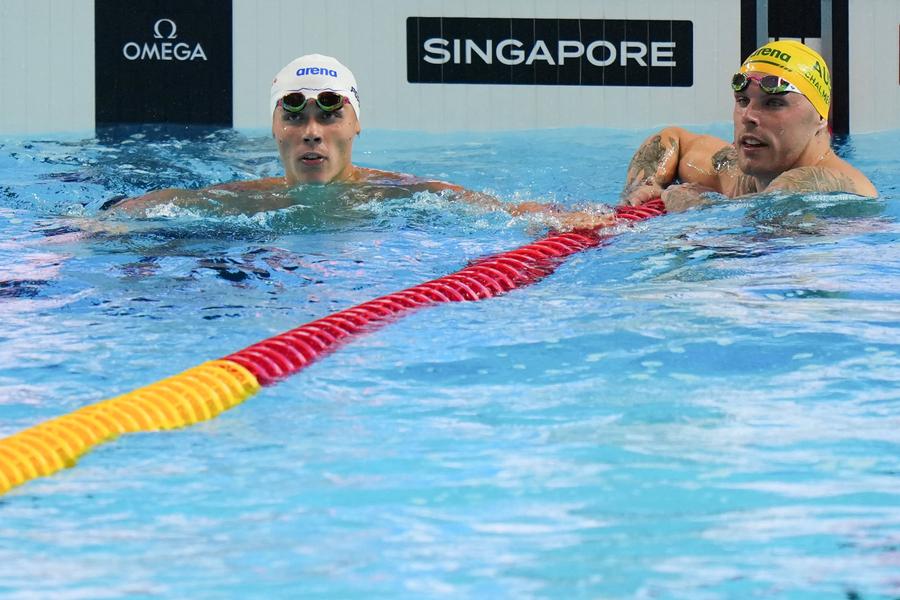 David Popovici și Kyle Chalmers FOTO: GettyImages Kyle Chalmers a făcut dezvăluiri din culisele Campionatelor Mondiale de la Singapore: „Mi-a spus că e obosit” » Ce schimbări a observat la David Popovici