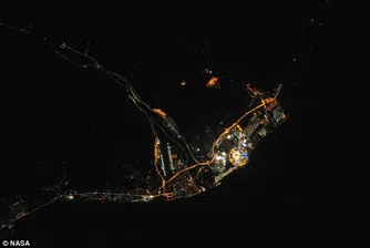 Олимпийският огън се вижда от Космоса (снимка на НАСА)