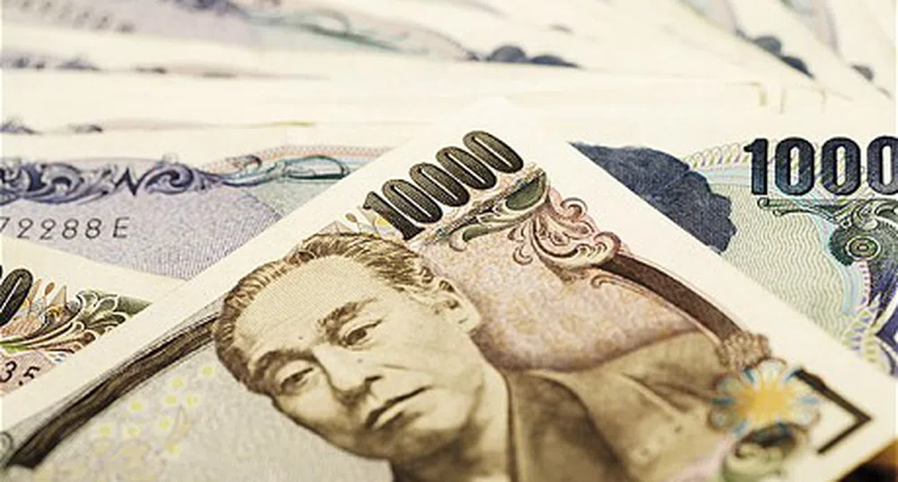 Доларът с 13-годишен връх спрямо йената, спад в Азия