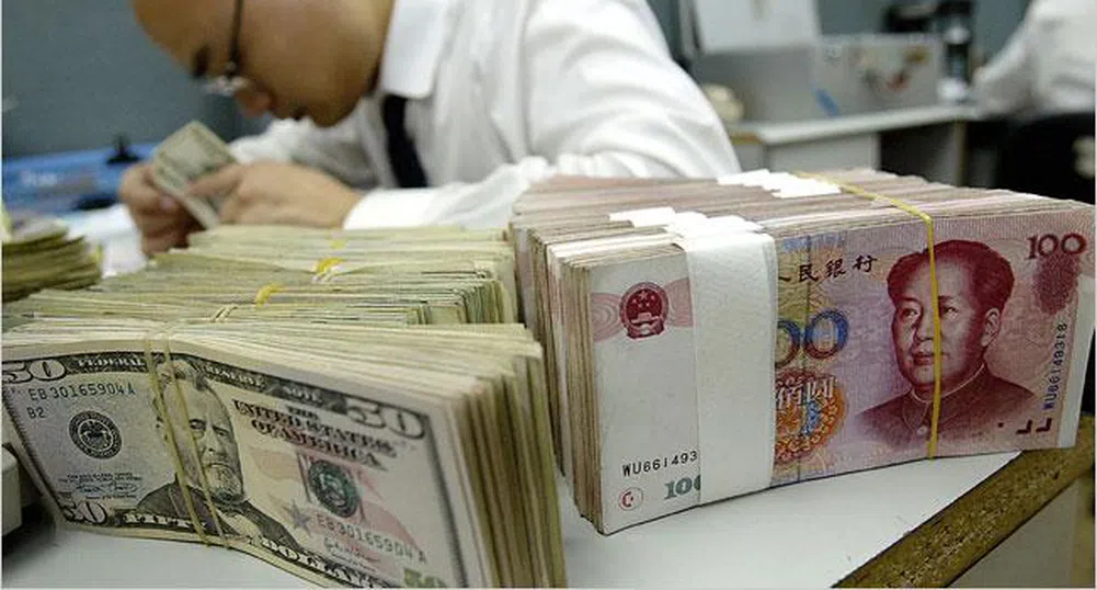 Китайският юан подценен с между 5-27%