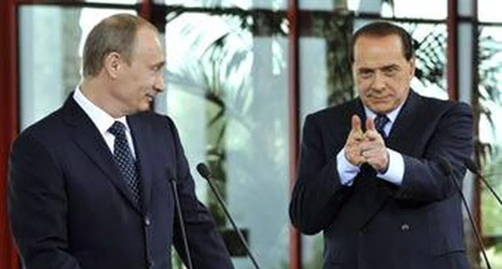 Путин и Берлускони си купуват остров
