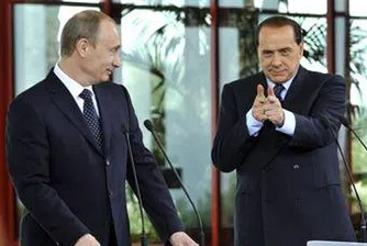 Путин и Берлускони си купуват остров