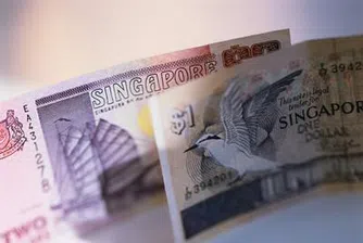 Сингапур реши неочаквано да ревалвира валутата си