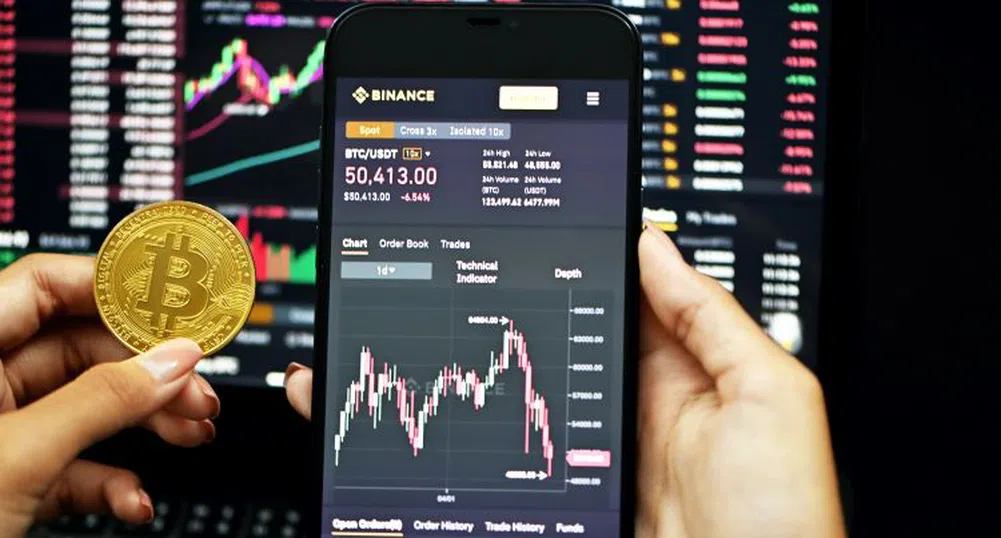 Срив или игра на курса? Защо Binance спря тегленията на биткойни