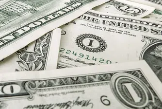 Доларът се стабилизира при ниски обеми на търговия преди Великден