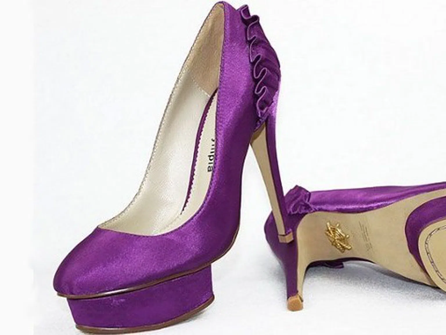 Обувки Charlotte Olympia за стилната съвременна жена