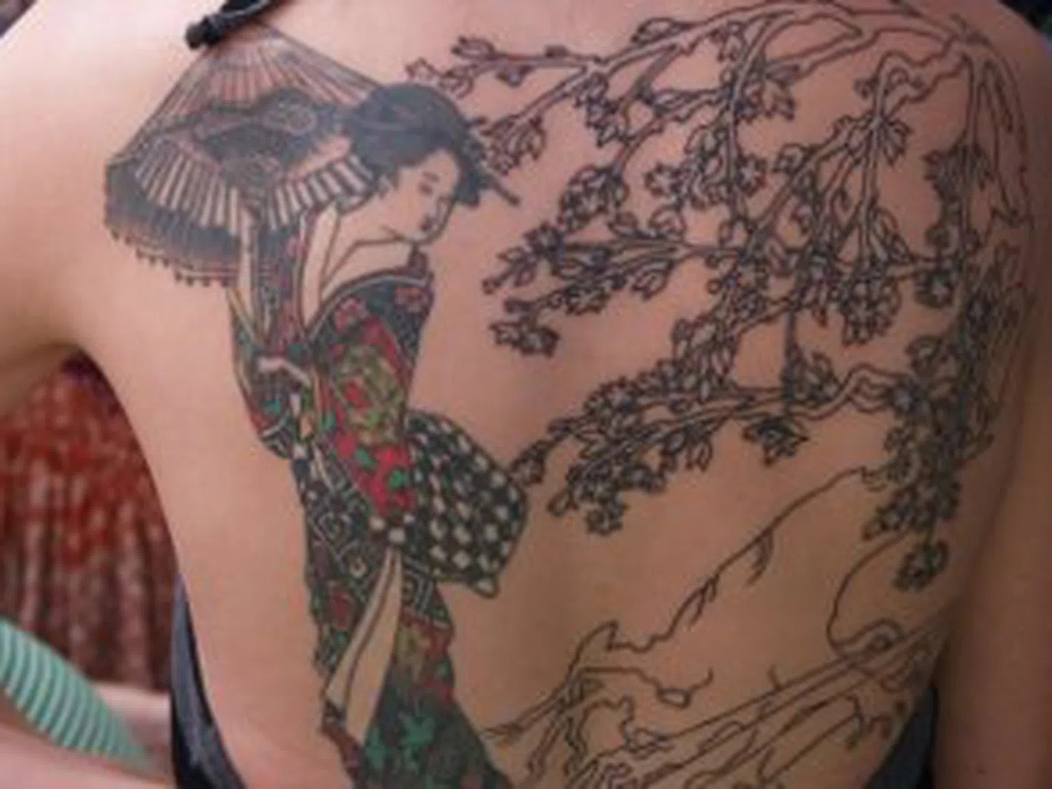 Какво символизират японските татуировки