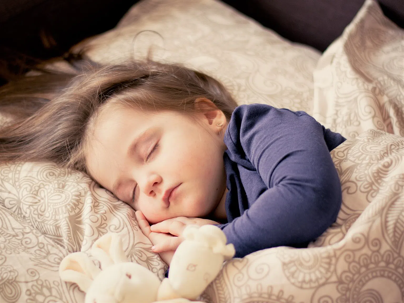 Защо е важно детето да заспива рано?