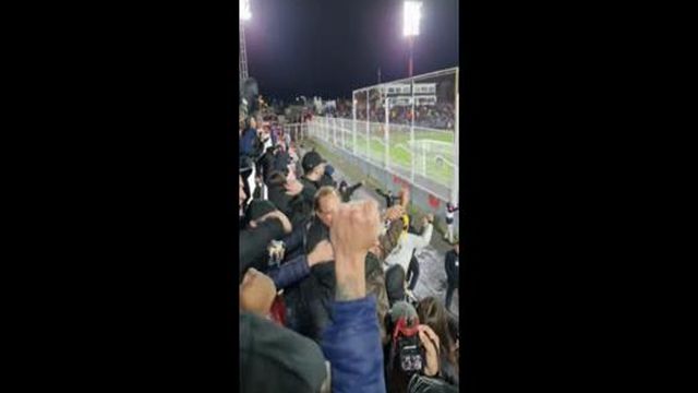 Textor na bancada com os adeptos a ver o Botafogo