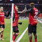 Grimaldo a festejar o primeiro golo do Leverkusen, de Boniface