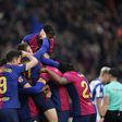 Jogadores do Barcelona a celebrarem o primeiro golo do encontro