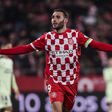 Abel Ruiz celebra, com os braços abertos, um golo marcado pelo Girona ao Las Palmas
