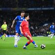Enzo Fernández e Vitinha em ação no duelo entre Chelsea e PSG para a Champions