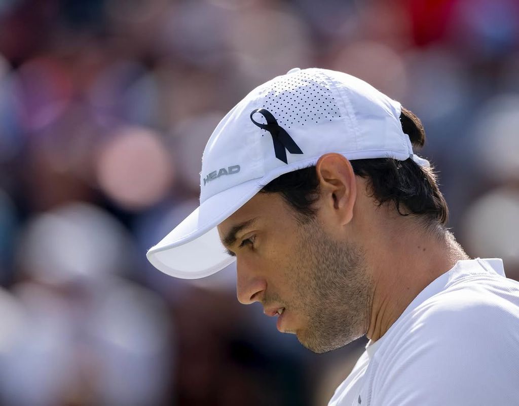 Nuno Borges está a jogar com laço negro no boné