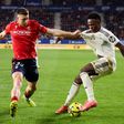 Abel Bretones num lance com Vini Jr. num jogo de LaLiga entre Osasuna e Real Madrid - Foto: IMAGO